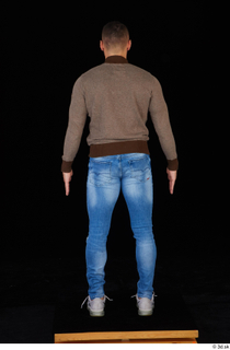 Arnost blue jeans brown sweatshirt clothing standing whole body 0005.jpg